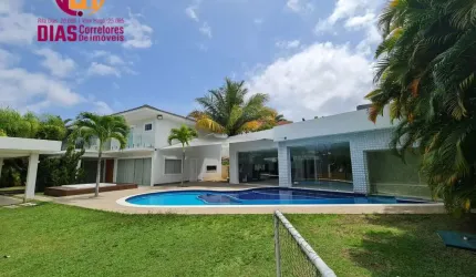 Linda Casa com 2 terrenos com 1000m2 de área total  com Piscina, sauna, espaço gourmet com churrasqueira, campo de futebol, 4 suítes completas  em Alphaville  Litoral  Norte- Casa  em Condomínio dúple