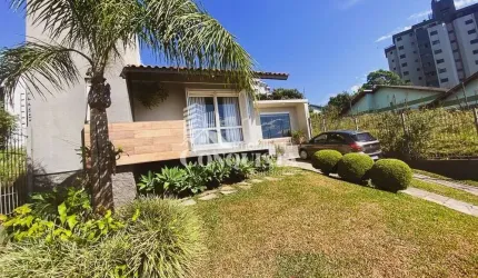 Casa com 3 quartos à venda na Paraná, 357, Jardim América, Caxias do Sul por R$ 1.190.000