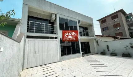Casa com 3 quartos à venda na Euclides da Cunha, 280, Centro, Canoas por R$ 950.000