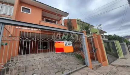 Casa com 3 quartos à venda na Rua Bélgica, 65, Marechal Rondon, Canoas por R$ 1.170.000
