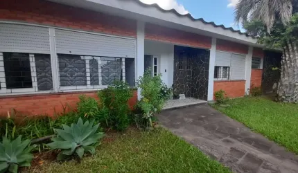 Casa com 4 quartos à venda na dos Gerânios, 20, Igara, Canoas por R$ 980.000