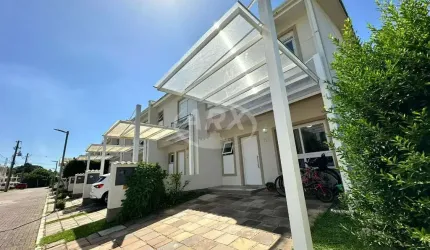 Casa em condomínio fechado com 3 quartos à venda na Avenida Armando Fajardo, 1977, Igara, Canoas por R$ 869.000