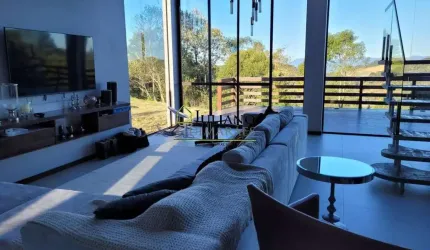 CASA À VENDA EM CONDOMÍNIO FECHADO - RANCHO QUEIMADO/SC.