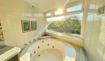 Casa em condomínio fechado com 3 quartos à venda na Rua Tocantins, 937, Lomba do Pinheiro, Porto Alegre, 291 m2 por R$ 1.588.900