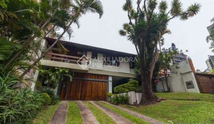 Casa em condomínio fechado com 4 quartos à venda na Rua Carlos Trein Filho, 1255, Auxiliadora, Porto Alegre, 440 m2 por R$ 3.990.000
