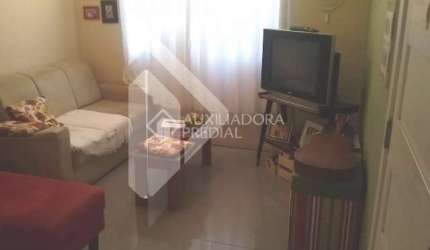 Casa em condomínio fechado com 3 quartos à venda na Rua Tenente Ary Tarrago, 1720, Protásio Alves, Porto Alegre, 84 m2 por R$ 375.000