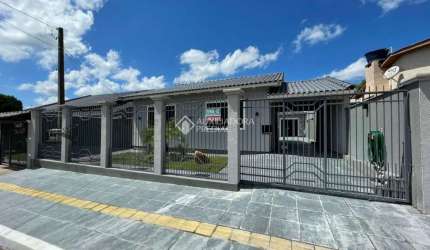 Casa em condomínio fechado com 4 quartos à venda na JOSE ALVES PEREIRA, 410, Girassol, Gravataí, 160 m2 por R$ 649.000