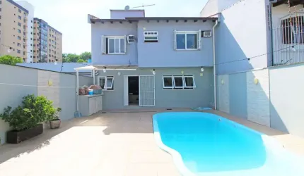 Casa com 4 quartos à venda na Rua Irene Capponi Santiago, 186, Cristo Redentor, Porto Alegre, 244 m2 por R$ 1.350.000