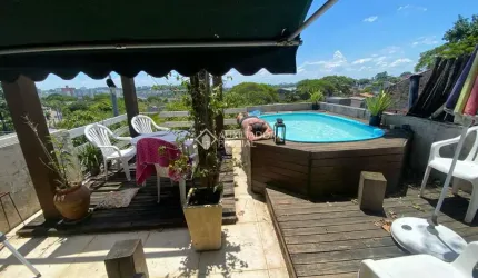 Casa com 3 quartos à venda na Rua Natércia Cunha Veloso, 267, Morro Santana, Porto Alegre, 270 m2 por R$ 798.000