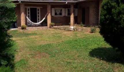 Casa em condomínio fechado com 3 quartos à venda na Rua Canários, 140, Águas Claras, Viamão, 250 m2 por R$ 390.000