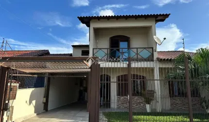Casa em condomínio fechado com 3 quartos à venda na Rua Francisca Lechner, 51, Parque Santa Fé, Porto Alegre, 220 m2 por R$ 950.000