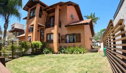 Casa em condomínio fechado com 4 quartos à venda na Rodovia Doutor Antônio Luiz Moura Gonzaga, 647, Rio Tavares, Florianópolis por R$ 4.500.000