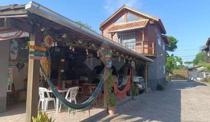 Prédio à venda na Rua da Figueira, 415, Praia do Rosa, Imbituba por R$ 1.600.000