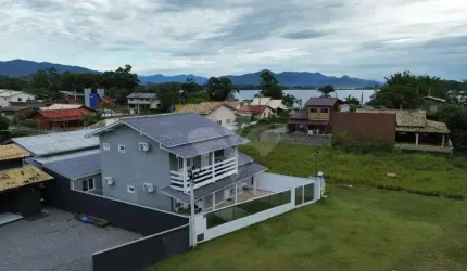 Casa em condomínio fechado com 3 quartos à venda na Beira Mar, 10, Ibiraquera, Imbituba por R$ 1.200.000