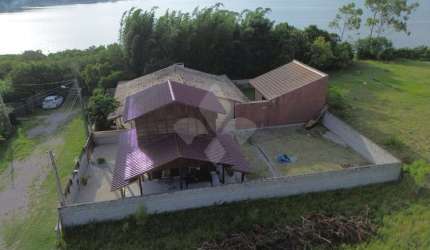 Casa em condomínio fechado com 1 quarto à venda na dos Geraneos, 65, Alto Arroio, Imbituba por R$ 600.000