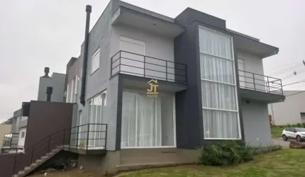 Casa em condomínio fechado com 3 quartos à venda na Rua Antônio Baggio, 100, Loteamento Jardim Timbaúva, Gravataí por R$ 850.000