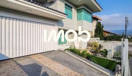 Casa com 4 quartos, sendo 3 suítes, Amizade