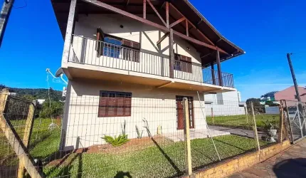 Casa com 6 dormitórios à venda, 284 m² por R$ 940.000,00 - Centro - Estância Velha/RS