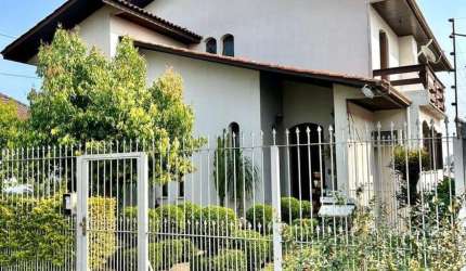 Casa com 4 quartos à venda na João Pola, 515, Rio Branco, Caxias do Sul por R$ 1.050.000