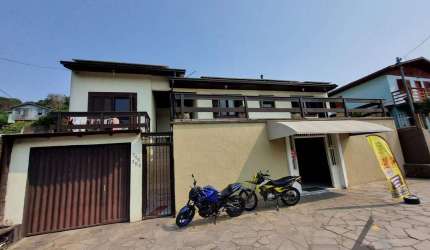 casa com 2 moradias mais ponto comercial - Bairro Charqueadas