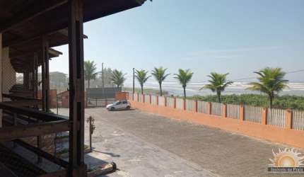 SOBRADO NA PRAIA FRENTE MAR COM PISCINA - 02 QUARTOS - 02 BANHEIROS - 0 2 VAGAS DE GARAGEM