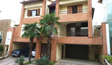 Casa Chácara Francesa | 3 Suítes | 4 Vagas | 378m² | Espaço Gourmet e Lazer Completo