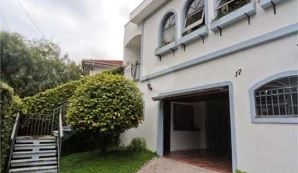 Sobrado Jardim França 3 suites, sala 2 ambientes, 6 vagas garage.