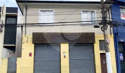 Prédio inteiro com loja e 3 residências