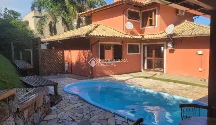 Casa em condomínio fechado com 4 quartos à venda na Rodovia Doutor Antônio Luiz Moura Gonzaga, 383, Rio Tavares, Florianópolis, 200 m2 por R$ 2.950.000