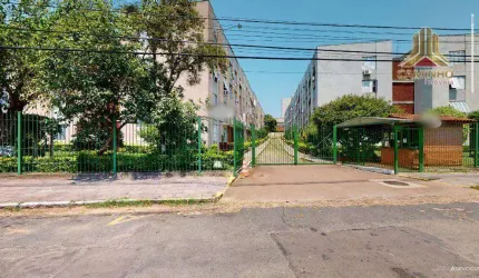 na Rua Eurico Lara em Porto Alegre, vendo apartamento de dois dormitórios com garagem