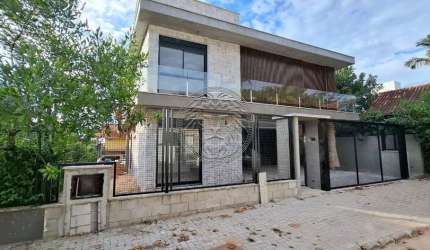 Casa em condomínio fechado com 4 quartos à venda no Campeche, Florianópolis  por R$ 3.985.000