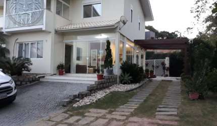 Casa em condomínio fechado com 3 quartos à venda na Barra da Lagoa, Florianópolis  por R$ 2.099.000