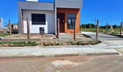 Casa 02 Dorm à venda no Bairro Jardim América com 76 m² de área privativa - 2 vagas de garagem