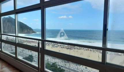 Apartamento localizado no leme, com quatro suítes, duas vagas de garagem