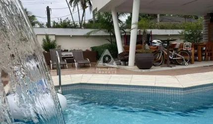 Casa em condomínio fechado com 4 suítes, piscina, sauna e sistema de geração de energia em Vargem Pequena