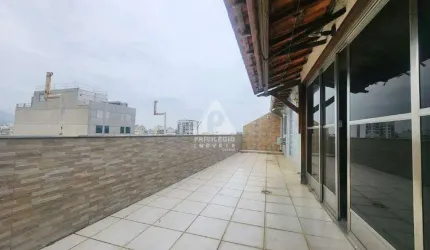 Cobertura duplex com vista lateral para o mar e 1 vaga em Copacabana