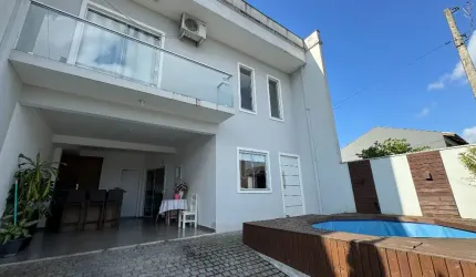 Sobrado geminado com 1 suíte com closet mais 1 quarto à venda no bairro  Floresta