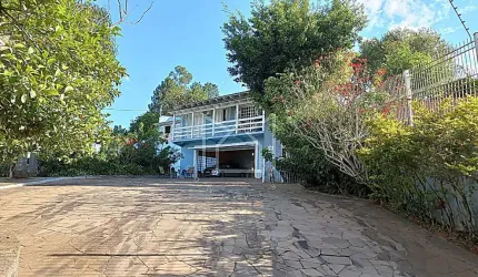 Casa com 4 quartos à venda na Avenida João Carlos Viale Dias, Tarumã, Viamão, 333 m2 por R$ 2.110.000