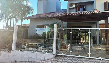 Casa com 4 quartos à venda na Rua Luiz Linck Barcelos, 160, Loteamento Jardim Timbaúva, Gravataí, 150 m2 por R$ 905.000