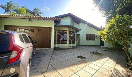 Casa com 3 quartos à venda na Rua Waldemar Guido Vicentini, 598, Dom Feliciano, Gravataí, 140 m2 por R$ 636.000
