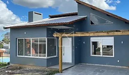 Casa em condomínio fechado com 2 quartos à venda na Rua Antônio Ramos, 440, Villa Lucchesi, Gravataí, 160 m2 por R$ 750.000