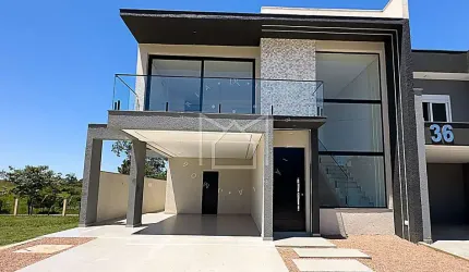 Casa em condomínio fechado com 3 quartos à venda na Rua Antônio Ramos, Loteamento Jardim Timbaúva, Gravataí, 159 m2 por R$ 1.180.000