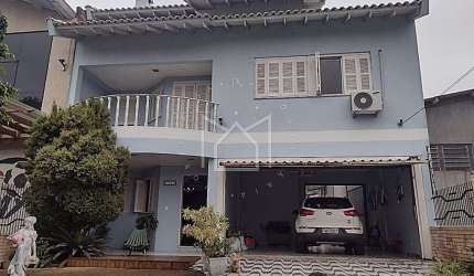 Casa com 5 quartos à venda na Rua Vinte de Setembro, Barnabé, Gravataí, 258 m2 por R$ 1.300.000