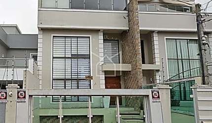 Casa com 3 quartos à venda na Rua Waldemar Guido Vicentini, Dom Feliciano, Gravataí, 135 m2 por R$ 890.000