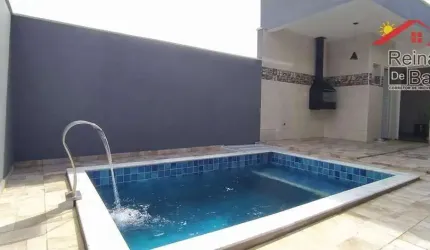 Casa com 3 dormitórios à venda a 50 mts da praia em Itanhaém .