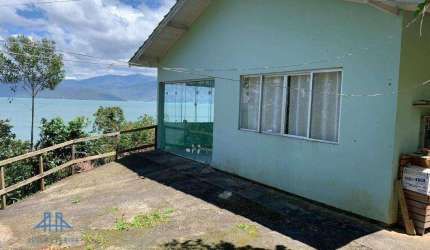 VENDO - CASA no Ribeirão da Ilha com linda vista para o mar com 02 (dois) lotes com 357m² cada. POR APENAS 590.000,00
