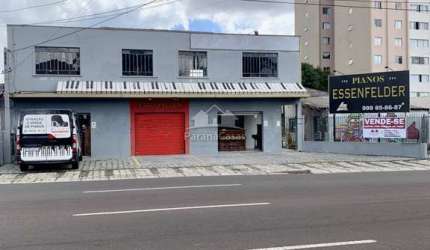 Casa à venda na Rua Irmãs Paulinas, 5060, Novo Mundo, Curitiba por R$ 2.800.000