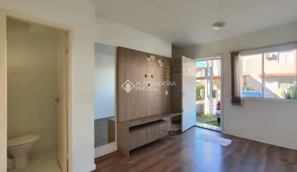 Casa em condomínio fechado com 2 quartos para alugar na Rua Maria Olinda Telles, 900, Canudos, Novo Hamburgo, 103 m2 por R$ 1.500