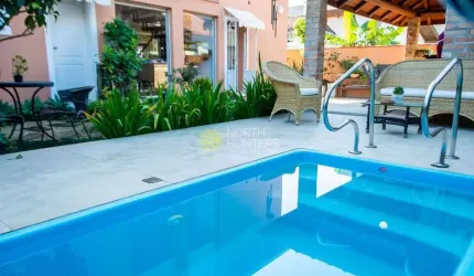 Casa com 4 dormitórios para aluguel de temporada, por R$ 2.000/dia - Jurerê Internacional - Florian