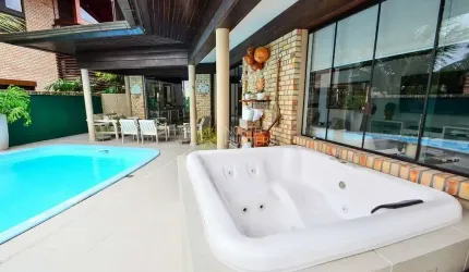Casa com 7 dormitórios, piscina e ofurô para alugar, por R$ 7.100/dia - Jurerê Internacional - Flor